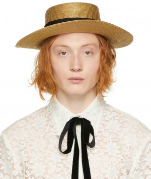 Золотисто-черная шляпа из ламе папье Gucci