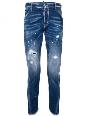 Зауженные джинсы с рваными деталями Dsquared2. Цвет: синий
