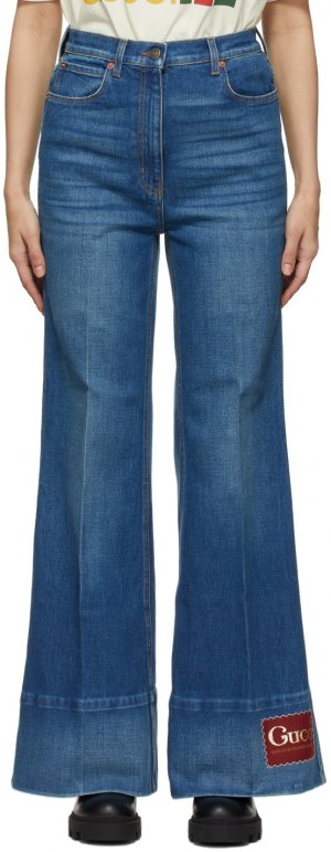Синие расклешенные джинсы с эффектом потертости Gucci