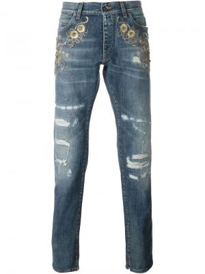 Декорированные джинсы с рваными деталями Dolce & Gabbana. Цвет: синий