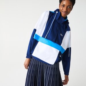 Верхняя одежда Женский пуловер-ветровка свободного кроя Lacoste. Цвет: синий