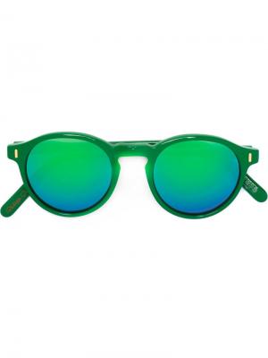 Солнцезащитные очки в круглой оправе Philippe Rouge. Цвет: зелёный