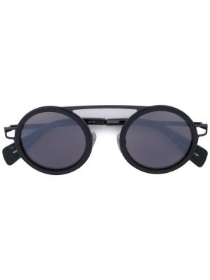 Солнцезащитные очки в круглой оправе Yohji Yamamoto. Цвет: серый