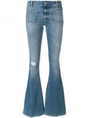 Расклешенные джинсы с декоративными дырами Dondup. Цвет: синий