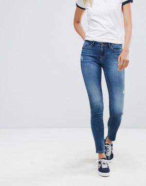 Состаренные зауженные джинсы Esprit. Цвет: синий