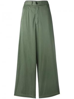 Расклешенные брюки Zucca. Цвет: зелёный
