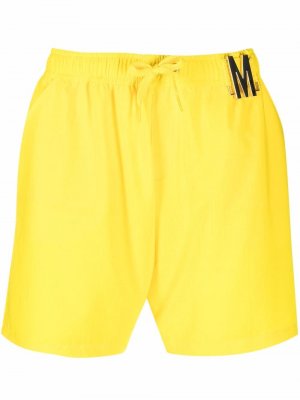 Плавки-шорты с логотипом Moschino. Цвет: желтый