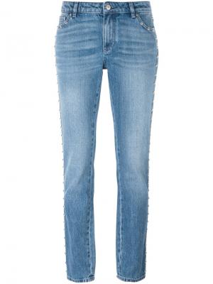 Зауженные джинсы с заклепками Givenchy. Цвет: синий