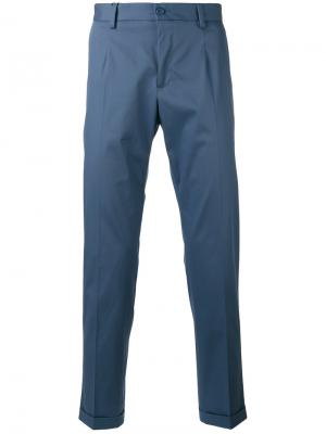 Классические брюки слим Dolce & Gabbana. Цвет: синий