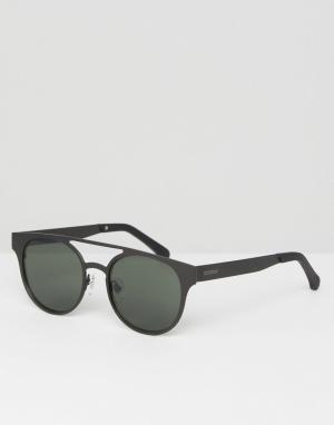 Круглые солнцезащитные очки с двойной переносицей черного цвета Komono. Цвет: черный