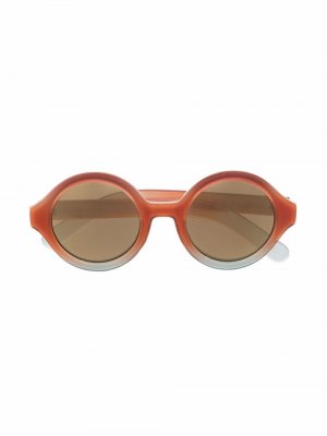 Солнцезащитные очки в круглой оправе Molo. Цвет: оранжевый