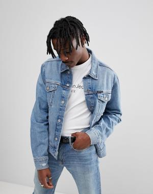 Джинсовая куртка с рваной отделкой Calvin Klein Jeans. Цвет: синий