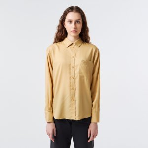 Блузы и рубашки Женская рубашка с нагрудным карманом Lacoste. Цвет: бежевый