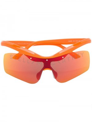 Футуристичные солнцезащитные очки с логотипом Stella McCartney. Цвет: оранжевый
