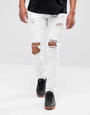 Белые джинсы скинни с рваной отделкой Mennace. Цвет: белый