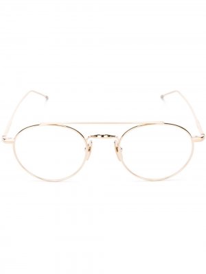 Оптические очки в круглой оправе Thom Browne Eyewear. Цвет: золотистый
