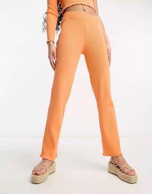 Оранжевые брюки-клеш Monki. Цвет: оранжевый