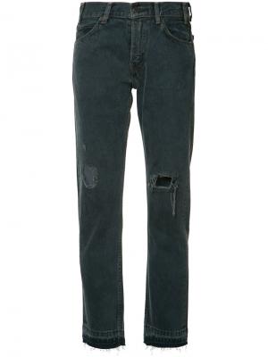 Прямые джинсы с рваными деталями Levis Levi's. Цвет: синий