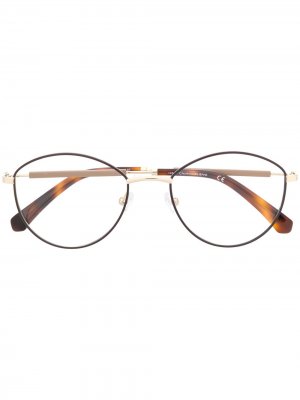 Солнцезащитные очки в круглой оправе черепаховой расцветки Calvin Klein Jeans. Цвет: коричневый