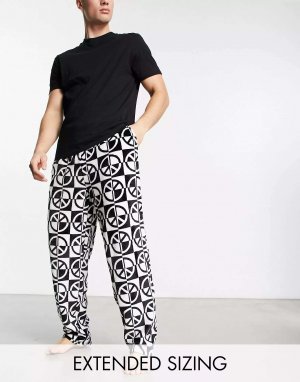 Черный пижамный комплект из футболки и брюк ASOS с флисовым принтом внизу
