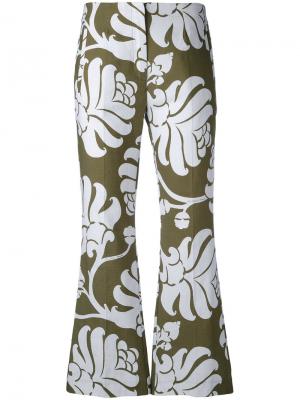 Укороченные расклешенные брюки с рисунком Jucca. Цвет: зелёный