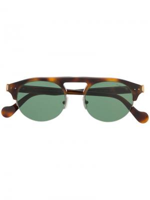 Солнцезащитные очки в круглой оправе Moncler Eyewear. Цвет: коричневый