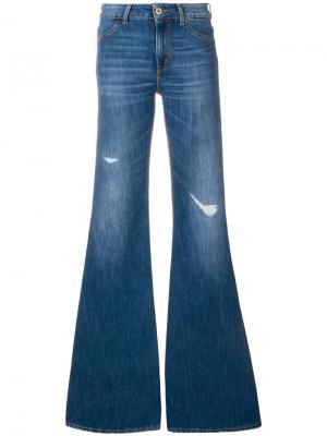 Расклешенные выбеленные джинсы с декоративными дырами Dondup. Цвет: синий