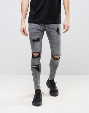 Суперзауженные джинсы с рваной отделкой SikSilk. Цвет: серый