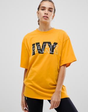 Желтая oversize-футболка с логотипом Ivy Park. Цвет: желтый