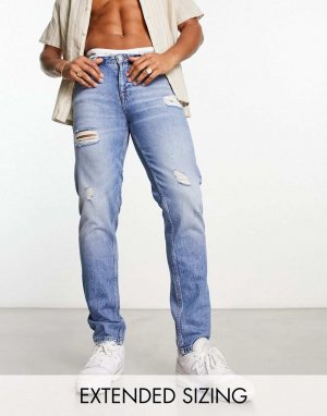 Винтажные синие джинсы ASOS DESIGN с рваными краями