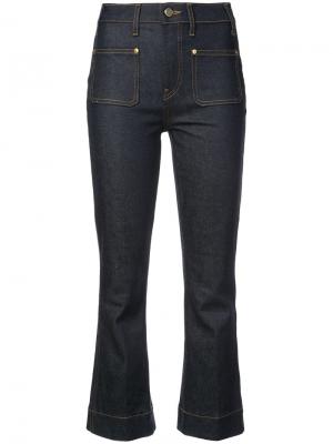 Укороченные слегка расклешенные джинсы Khaite. Цвет: синий