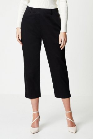 Укороченные эластичные брюки Petite с боковой молнией , черный Wallis