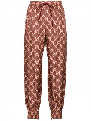 Спортивные брюки с узором GG Supreme Gucci. Цвет: красный