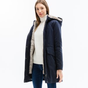 Верхняя одежда Женская утеплённая куртка-парка Lacoste. Цвет: синий