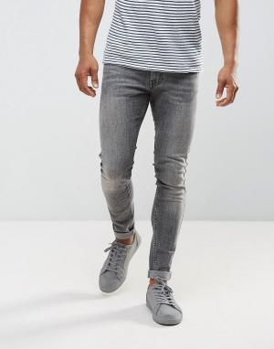 Серые выбеленные супероблегающие джинсы Just Junkies. Цвет: серый
